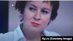 Was Daria Aslamova heading to Kosovo to report -- or to spy for the Kremlin?