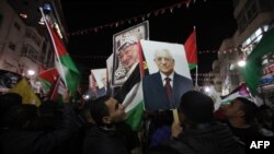 Палестиндер БУУда байкоочу мүчө макамын алышын майрамдап жатат. Рамалла, 29-ноябрь, 2012.