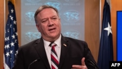 (FILES) In this file photo taken on March 17, 2020, US Secretary of State Mike Pompeo speaks at a press conference at the State Department in Washington DC.