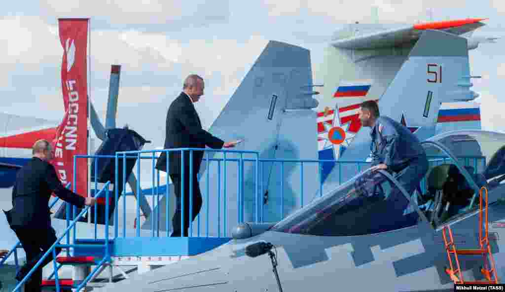 RUSSIA -- Russian President Vladimir Putin and his Turkish counterpart Recep Tayyip Erdogan inspect a Sukhoi Su-57 fighter jet as they visit the MAKS 2019 air show in Zhukovsky, outside Moscow, August 27, 2019