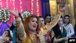 FILE: Transgender people in Pakistan -- locally known as Khusra or Heejra -- claim to be cultural heirs of the eunuchs who served as senior courtiers to the Indian subcontinent’s Mughal rulers in the 17th and 18th centuries.