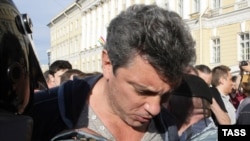 Boris Nemtsov of the Solidarity movement is detained during a protest rally in St. Petersburg on May 31.