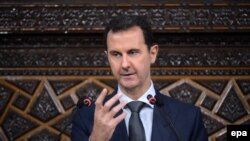 Președintele sirian Bashar al-Assad adresându-se Parlamentului