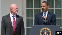 U.S. President Barack Obama (right) with national intelligence director nominee General James Clapper in Washington on June 5.