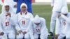 Players for Iran's women's national soccer team react after the disqualification announcement in Amman, Jordan, on June 3.