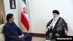 Pakistani Prime Minister Imran Khan meeting with Iran's Supreme Leader Ali Khamenei to discuss regional tensions. October 13, 2019
