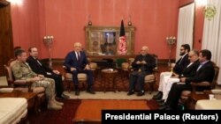 Afghanistan's President Ashraf Ghani (Right) and U.S. special envoy for peace in Afghanistan, Zalmay Khalilzad, (Left) meet in Kabul, Afghanistan November 10, 2018. File photo