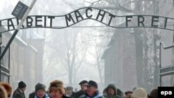 Visitors enter the Auschwitz-Birkenau camp in Oswiecim.