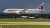 FILE- in this file photo dated Wednesday, July 11, 2012, onlookers watch as a Qatar Airways Boeing 787 Dreamliner lands during an aerial display at the Farnborough International Airshow, in Farnborough, England. The state-owned Commercial Aircraft Corp. 