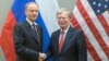 John Bolton (right), the U.S. national security adviser, shakes hands with his Russian counterpart, Nikolai Patrushev, during a meeting in Geneva on August 23.