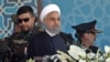 IRAN - Iranian President Hassan Rouhani sits among senior army staff as he delivers his speech during the annual military parade marking the anniversary of the outbreak of its devastating 1980-1988 war with Saddam Hussein's Iraq, on September 22, 2017