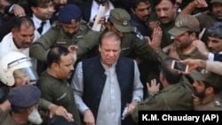 Former Pakistani Prime Minister Nawaz Sharif arrives at a court in Lahore on corruption charges in October 2019.