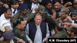 Former Prime Minister Nawaz Sharif arriving at a court in Lahore on October 11, 2019. After his conviction was suspended, he left for London to pursue medical treatment.