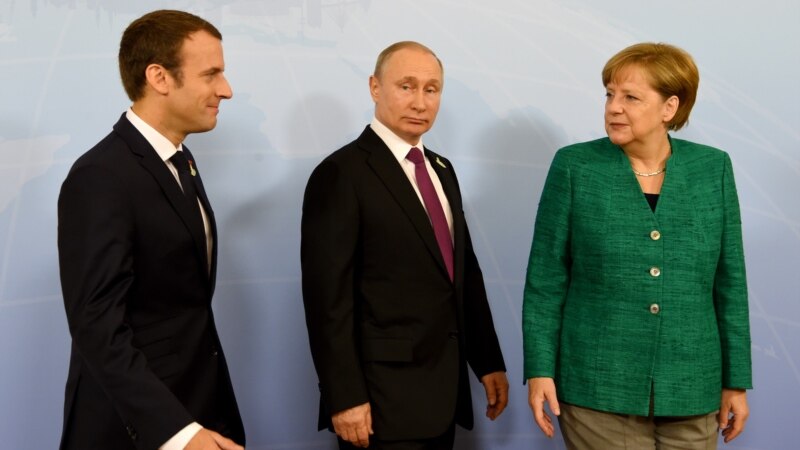 Putin, Makron i Merkel za pojačanu razmenu vesti o Siriji 