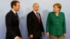 Almaniya kansleri Angela Merkel (sağda), Rusiya prezidenti Vladimir Putin(ortada) və Fransa prezidenti Emmanuel Macron 