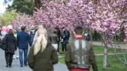 People walk in Kyiv's Kyoto Park on April 27.