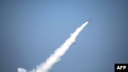 FILE: Pakistani nuclear-capable cruise missile is launched from a submarine during a test firing at an undisclosed location in January 2016.