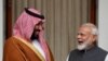 Saudi Arabia's Crown Prince Mohammed bin Salman and India's Prime Minister Narendra Modi react ahead of their meeting at Hyderabad House in New Delhi, India, February 20, 2019. REUTERS/Adnan Abidi