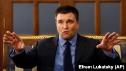 Ukrainian Foreign Minister Pavlo Klimkin stayed away, writing on Facebook that ending sanctions will start the process of "normalizing" everything Russia has done.