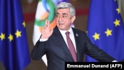 Armenian President Serzh Sarkisian arrives for an EU Eastern Partnership summit with six eastern partner countries at the European Council in Brussels on November 24.