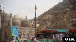 The attacks come amid crowded Norouz celebrations -- like this one today in the Afghan capital, Kabul -- to mark advent of spring and the new year.