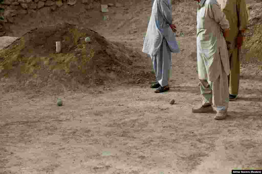 The traditional Hazara game involves two teams taking turns hurling stones at a beer can-sized target. The first team to hit the target 10 times wins.