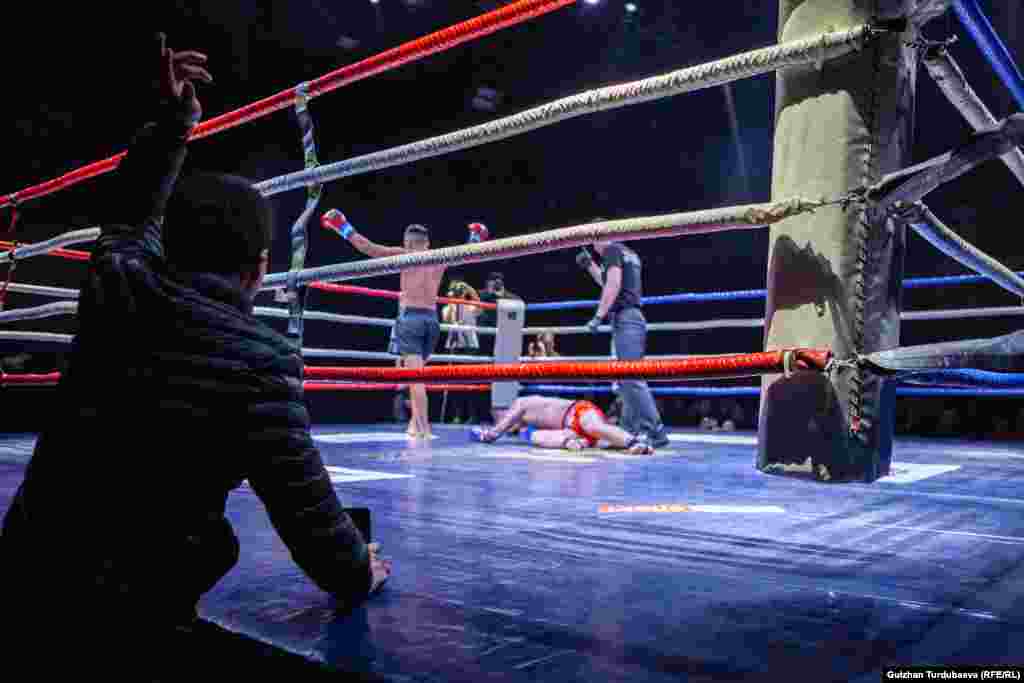 Participants are seen during a K-1 kickboxing tournament in Bishkek, Kyrgyzstan, on February 25. (Gulzhan Turdubaeva, RFE/RL)