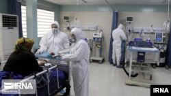 Health workers in Iranian hospital. 