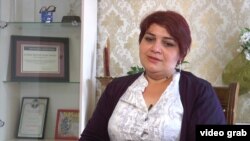 Azerbaijani journalist Khadija Ismayilova spent time in prison on charges that were widely seen as retaliation for her award-winning investigative reporting on the wealth of President Ilham Aliyev and his family. (file photo)