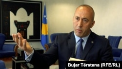 Kosovar Prime Minister Ramush Haradinaj gestures during an interview with RFE/RL in March.