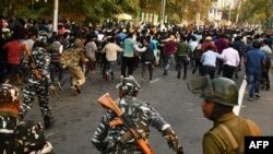 The vote in parliament came as angry protests against the bill intensified in India's northeastern regions bordering Bangladesh, with police clashing with demonstrators in Assam state.