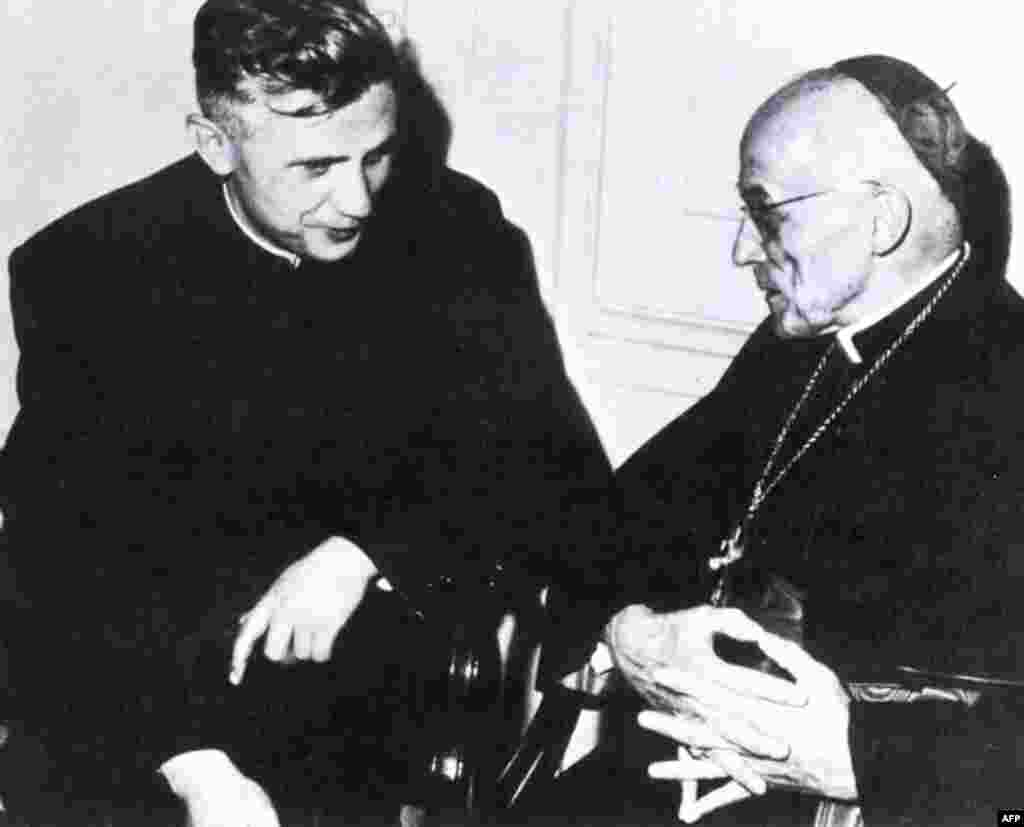 Josef Ratzinger (left), then a professor of theology, talks with Cologne's Cardinal Joseph Frings in Rome, between 1962 and 1965.