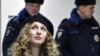 Moscow Courts Fine Two Members Of Pussy Riot Protest Group Over Pro-LGBT Action