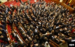 The Ukrainian parliament votes to approve new antiprotest laws. It sparked a fresh wave of protests on January 16.