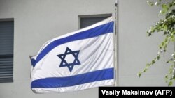 RUSSIA -- An Israeli flag flies at the Israeli embassy in Moscow, September 18, 2018
