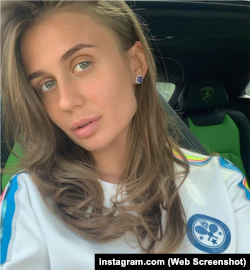 Alyona Benderskaya behind the wheel of a Lamboghini