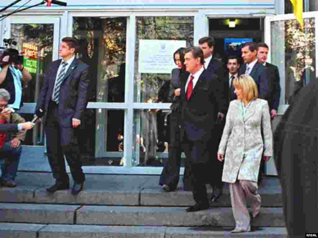 President Viktor Yushchenko leaves a Kyiv polling station with his wife, Katerina Chumachenko (front), and his daughter, Vitalina (behind him). Yushchenko signed a decree on April 2 dissolving parliament and ordering new elections