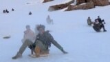 Not A Sled, Not A Snowboard: It's An Afghan Surcha