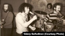 Valery Saifudinov, a pioneer of Soviet rock music, sings at his last concert before emigrating to the United States. Riga, 1974.