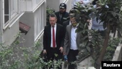 U.S. pastor Andrew Brunson arrives at his home after his trial in Izmir on on October 12.