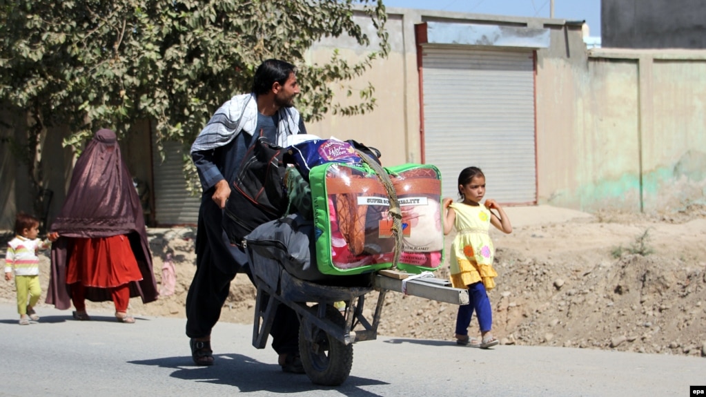 Thousands Flee As Taliban Take Key Afghan District thumbnail
