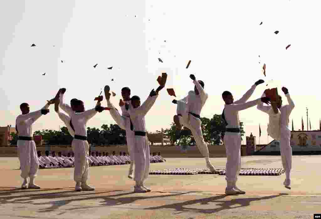 Pakistani Rangers perform during a graduation ceremony in Karachi on November 11. (epa/Rehan Khan)