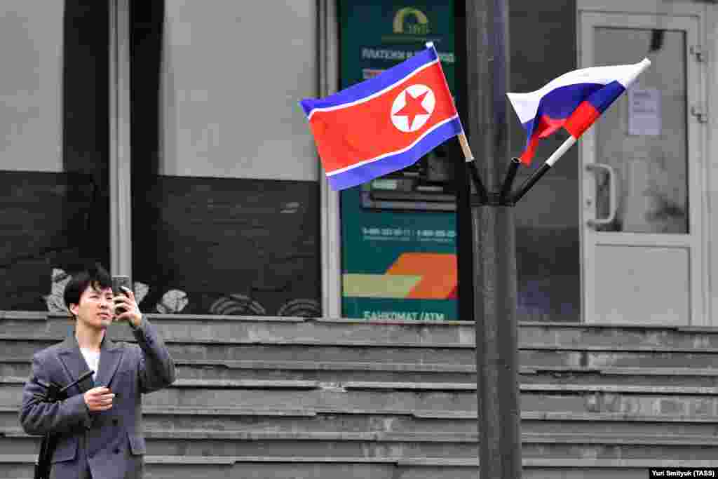 North Korean and Russian flags hang from lampposts in Vladivostok. The April 25 summit will be the first meeting of the two countries&#39; leaders.