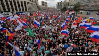 Activists Fined for Red Square U.S.-Russian Flag Photo – Reports - The  Moscow Times