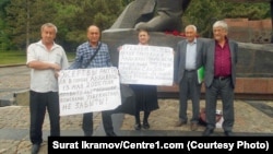 Rights activists hold a demonstration in Tashkent on May 13 to mark the anniversary of a bloody 2005 government crackdown on protesters in the city of Andijon that left scores dead. 