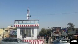 Ауғанстанның Құндыз қаласына тігілген "Талибан" туы. (Көрнекі сурет).