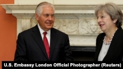 Britain's Prime Minister Theresa May greets U.S. Secretary of State Rex Tillerson at 10 Downing street in London, September 14, 2017