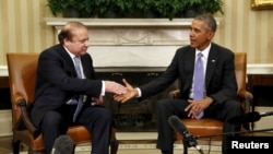 U.S. President Barack Obama meets with Pakistani Prime Minister Nawaz Sharif in the Oval Office of the White House in Washington on October 22.