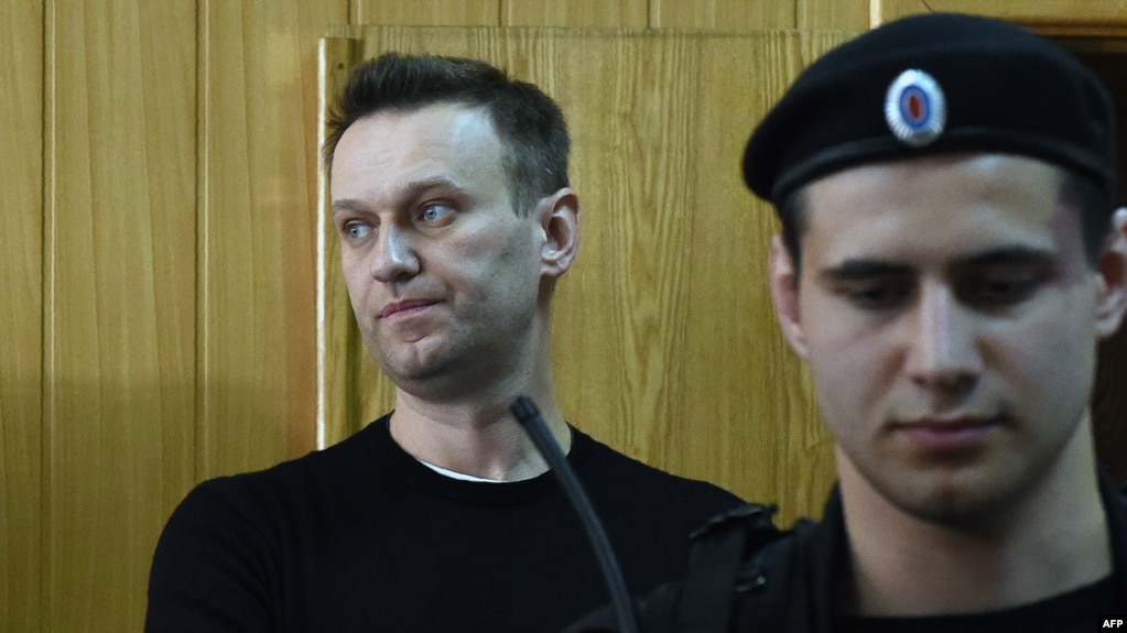 Russian opposition leader Aleksei Navalny attends a court hearing after being detained at a protest rally against corruption in Moscow on March 27.