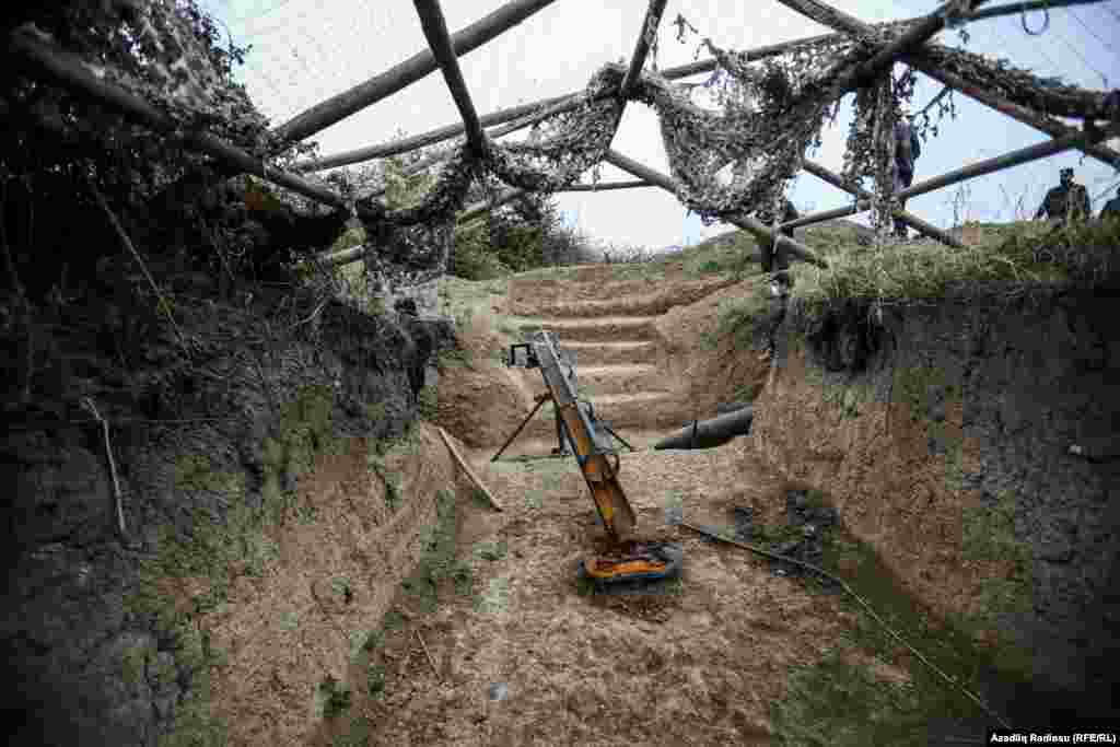 This Armenian homemade 200-millimeter gun was found in an abandoned trench. 